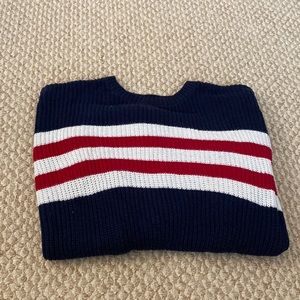 Hollister brand Size M sweater. Dark blue color with white and red stripe.